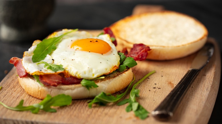 fried egg sandwich with greenery