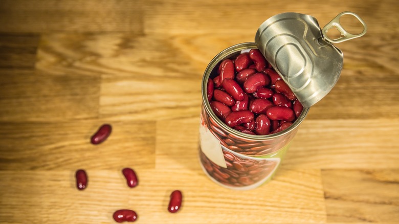 Open can of kidney beans on kitchen counter