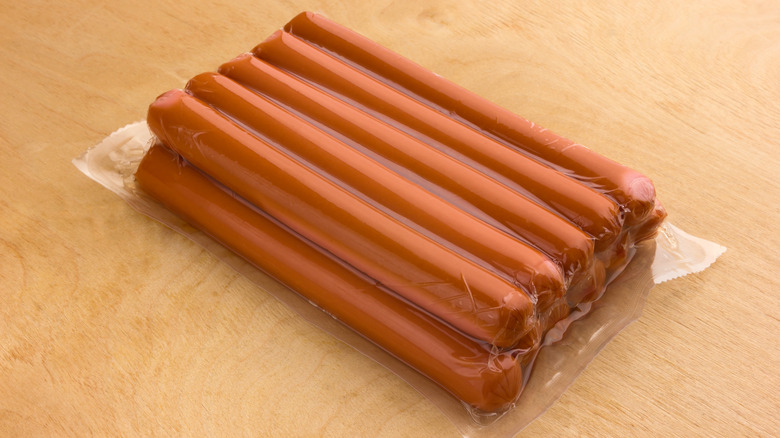 Sealed package of hot dogs