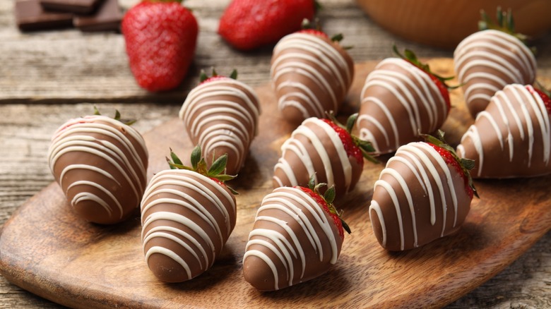 A platter of freshly coated strawberries 