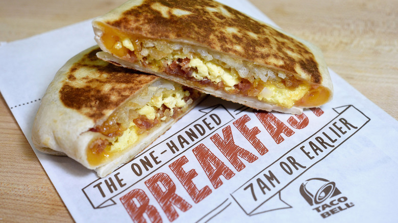 An early version of the California Crunchwrap from Taco Bell cut in halves