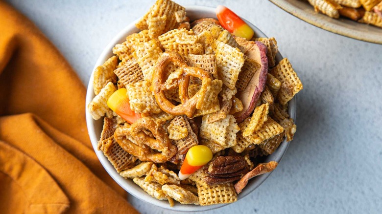 autumn chex mix in a white bowl