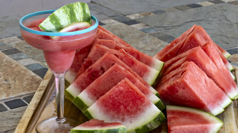 Watermelon slices on a pink background