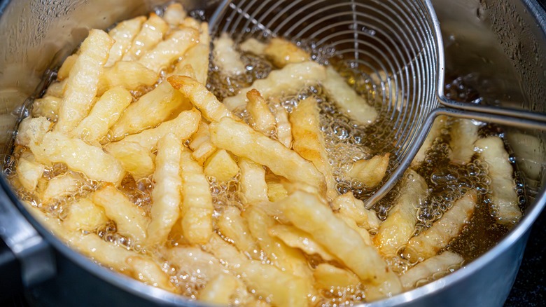 potatoes frying in oil