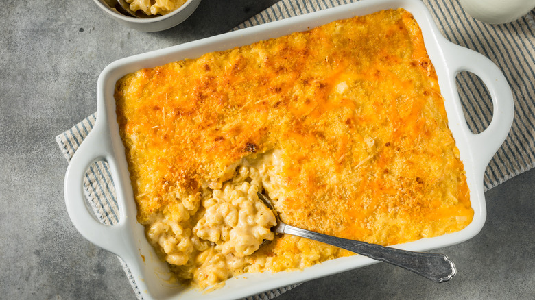 Pan of baked macaroni and spoon