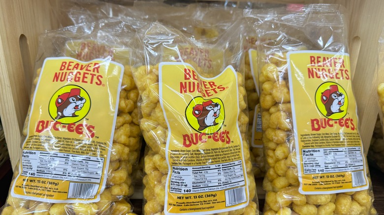 three bags of buc-ees beaver nuggets on display