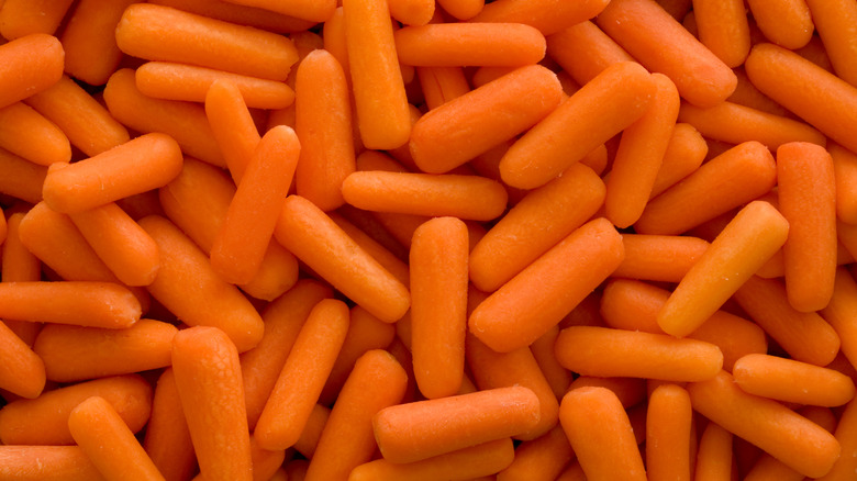 close up of a bunch of baby carrots